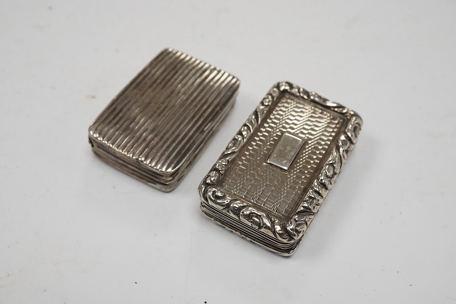 A George IV silver rectangular vinaigrette, John Thropp, Birmingham, 1824, 40mm (a.f.) and one other ribbed silver vinaigrette. Condition - poor